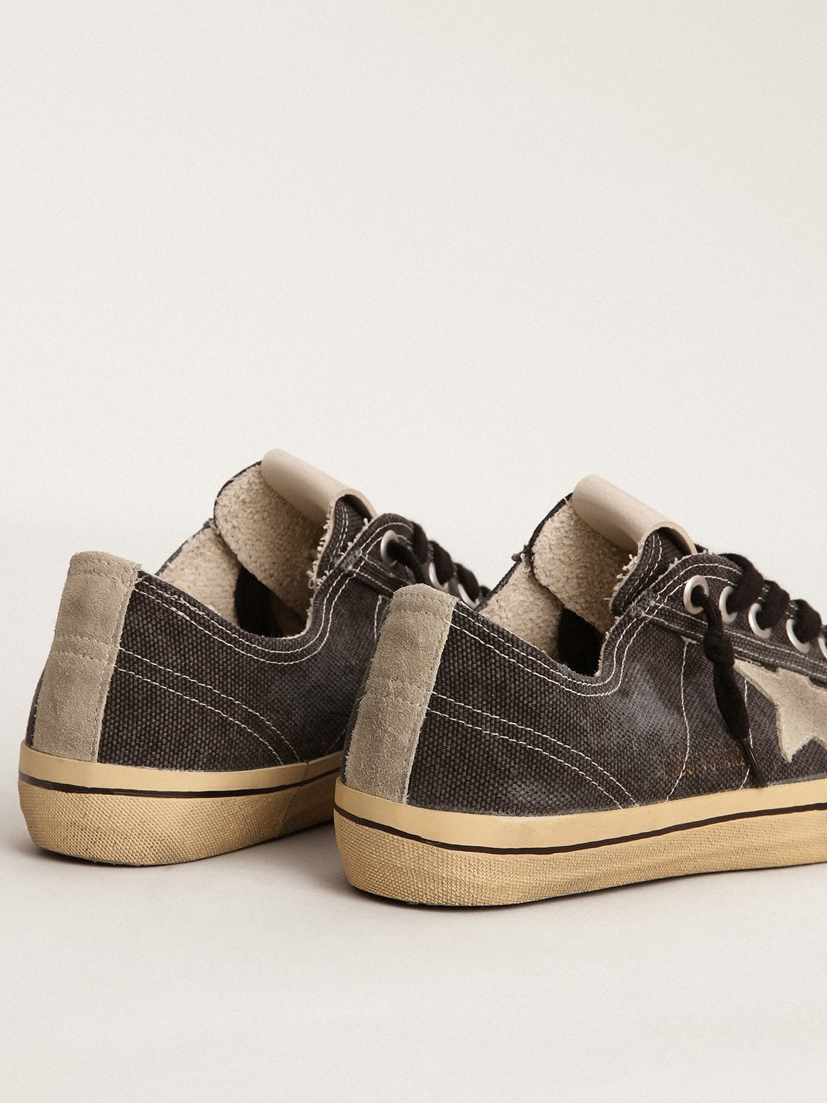 Golden Goose Men's V-Star in black canvas with ice-gray star and heel