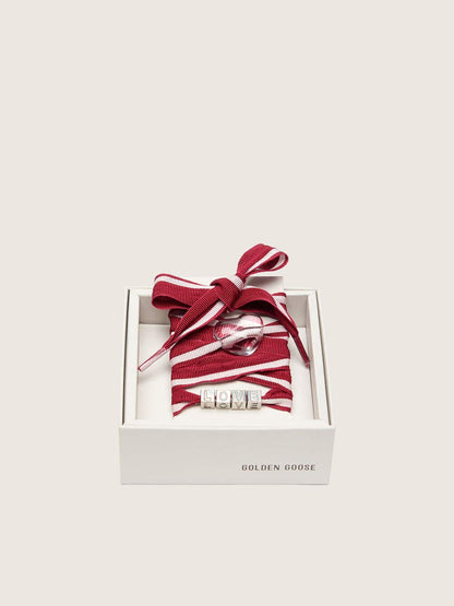 Golden Goose Skins red and white striped laces with charms