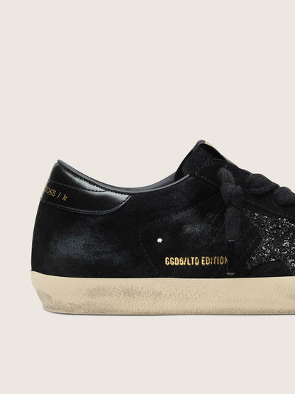 Golden Goose Women's Super-Star LTD in black suede with black glitter star and black leather heel tab