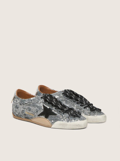 Golden Goose Women's True-Star in silver sequins with black star and silver leather heel tab
