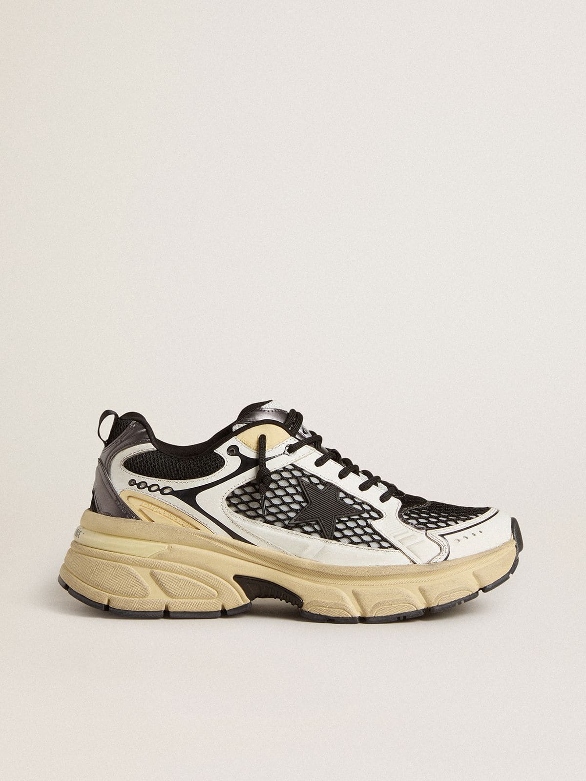 Golden Goose Women’s Lightstar in white leather and black mesh with black TPU star