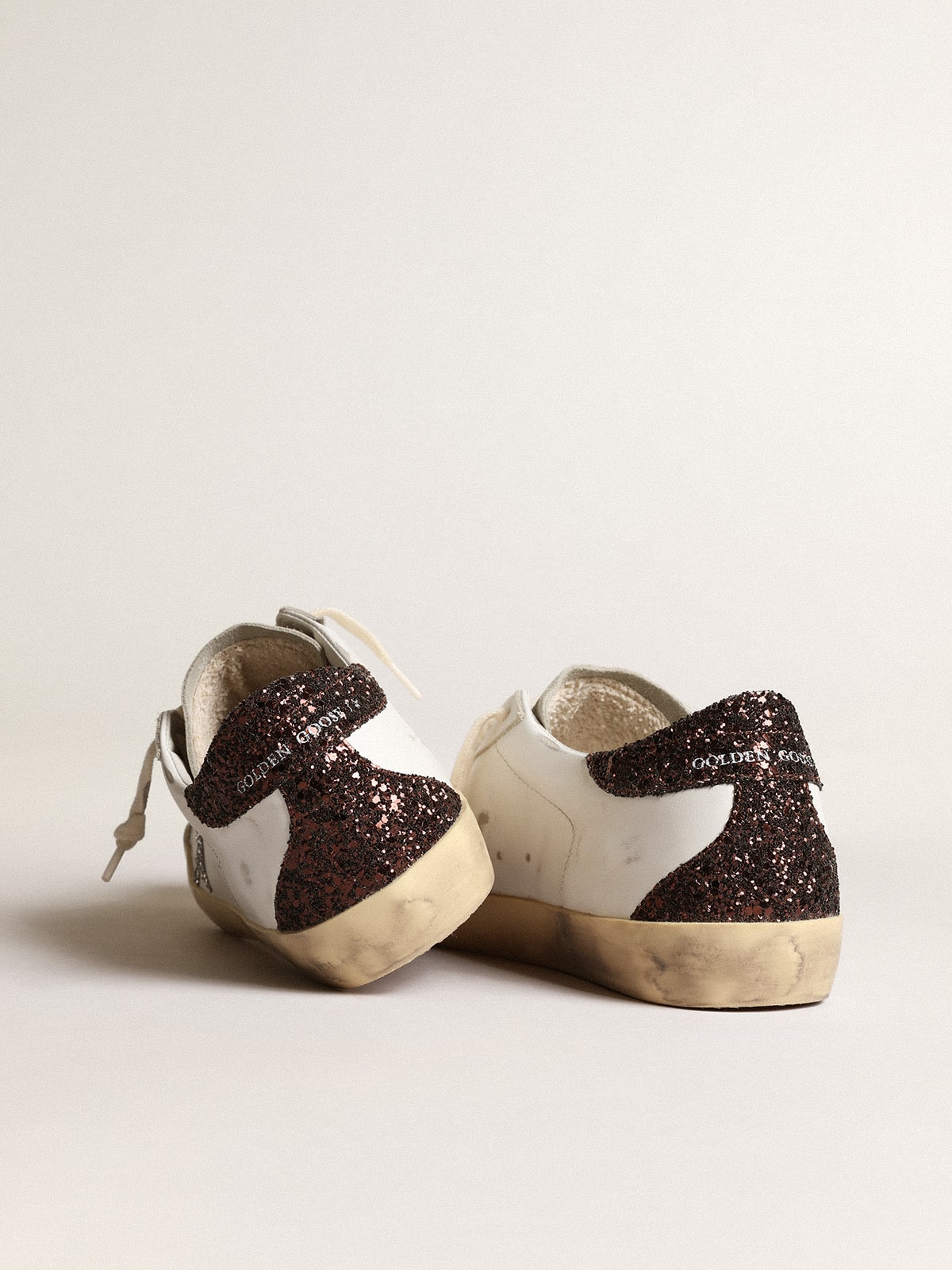 Golden Goose Women's Super-Star with silver star and brown glitter heel tab