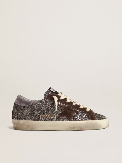 Golden Goose Super-Star in glitter with a brown star and lilac heel tab