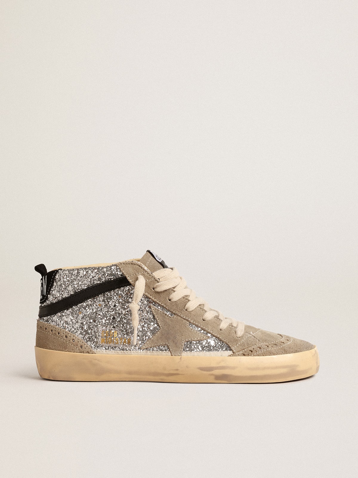 Golden Goose Mid Star in silver glitter with suede star and black flash