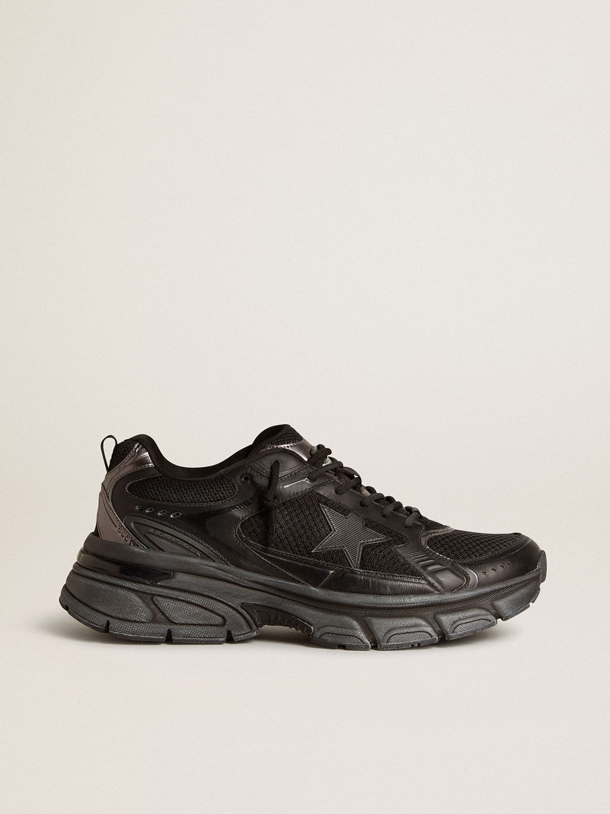 Golden Goose Women’s Lightstar with black leather and mesh upper and black star