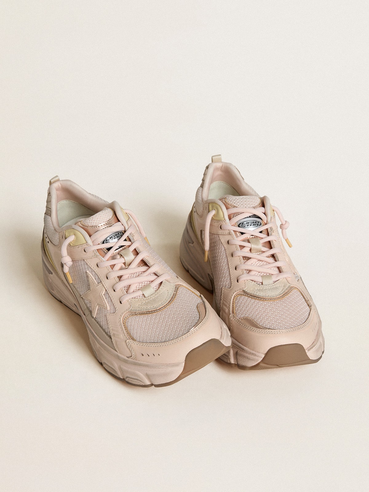 Golden Goose Women’s Lightstar with pink leather and mesh upper and pink star