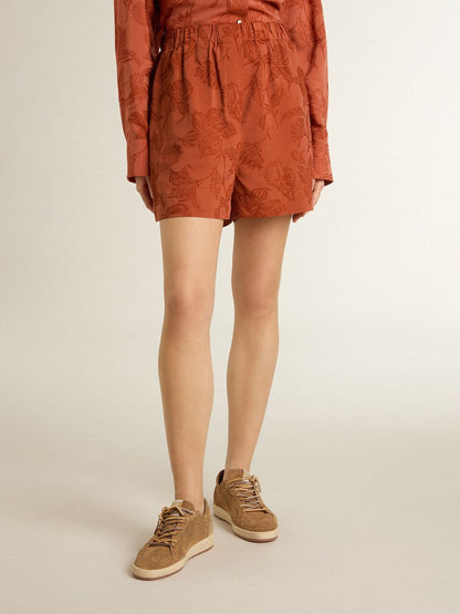 Golden Goose Women's shorts in brick-red jacquard with marine floral pattern