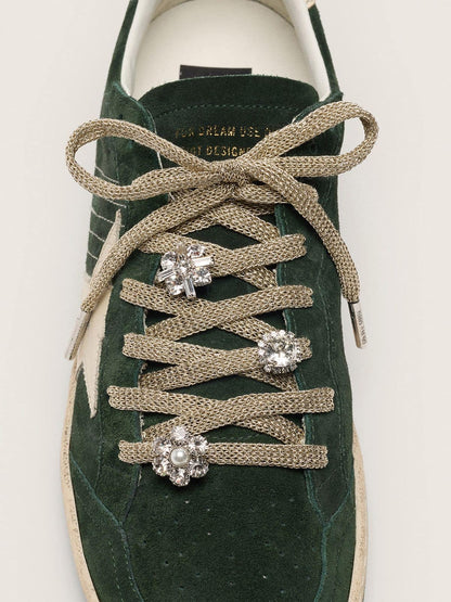 Golden Goose Skins braided gold-colored laces with shimmering charms