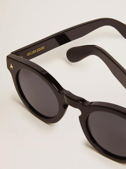 Golden Goose Sunframe Panthos model with black frame and gold details