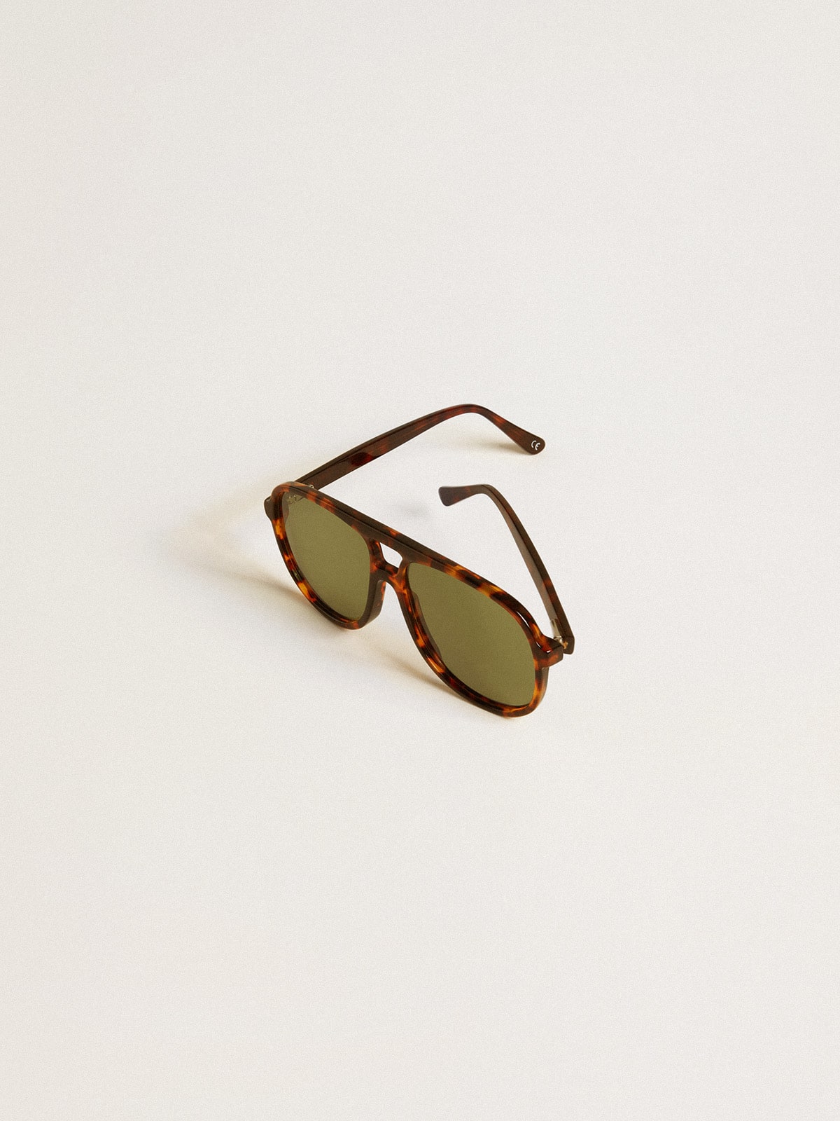 Golden Goose Aviator style sunglasses with tortoiseshell frame and green lenses
