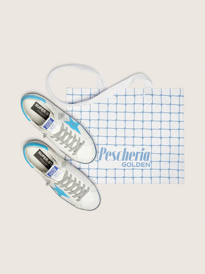 Golden Goose Men's Super-Star LTD in white leather with light blue leather star and heel tab