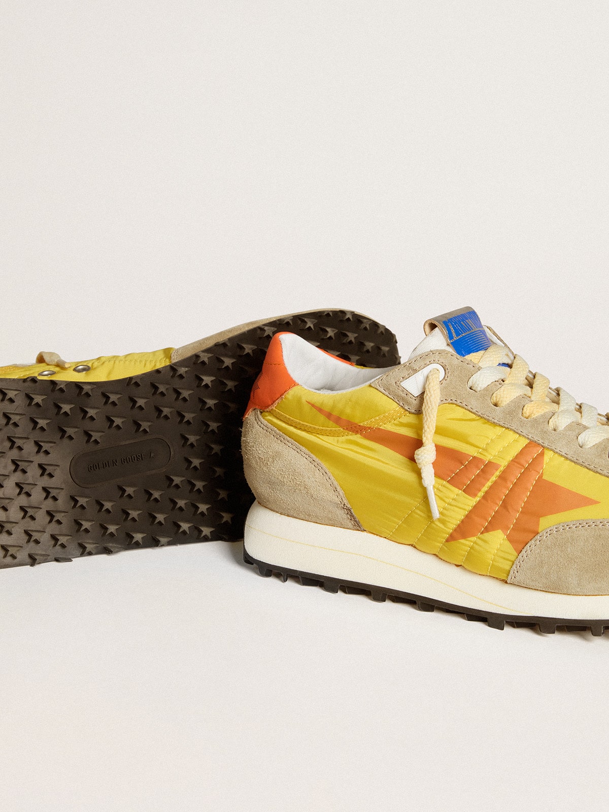 Golden Goose Men’s Marathon with yellow nylon upper and orange star