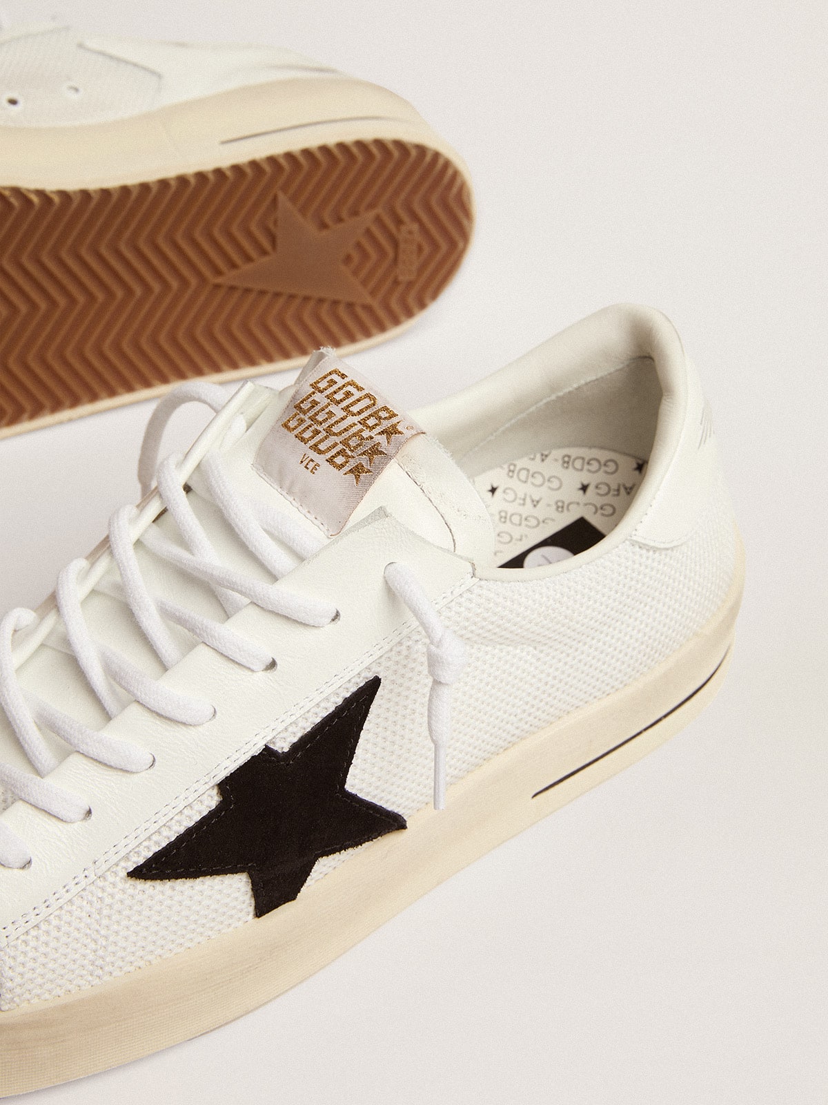Golden Goose Men's Stardan in white mesh with black suede star