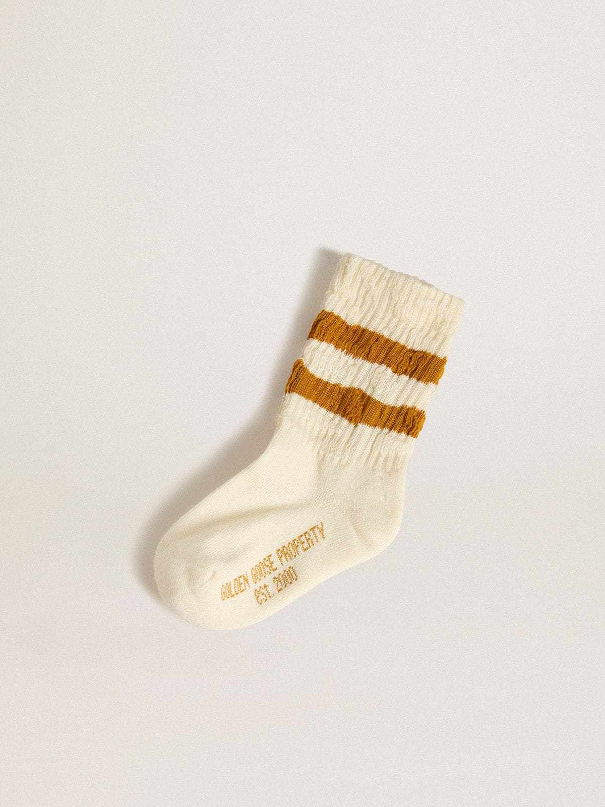 Golden Goose Kids’ white socks with tobacco-colored stripes