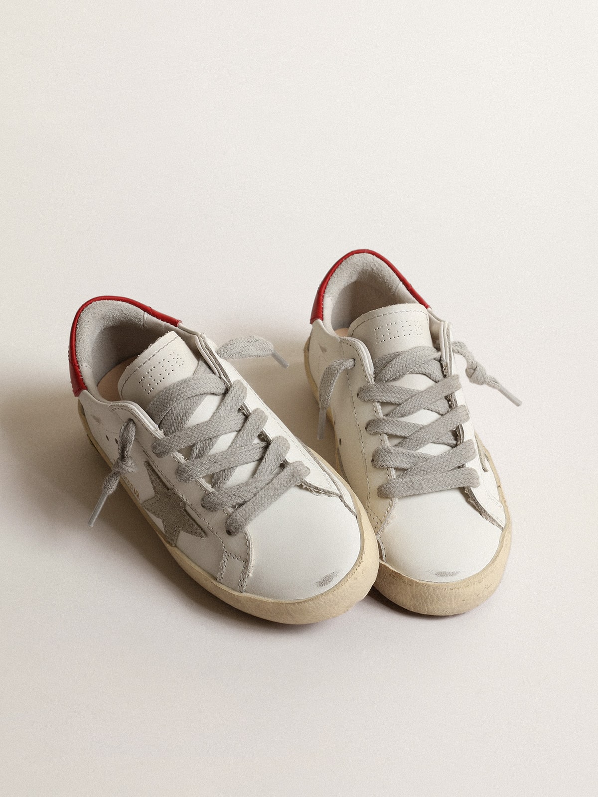 Golden Goose Super-Star Young with suede star and red leather heel tab