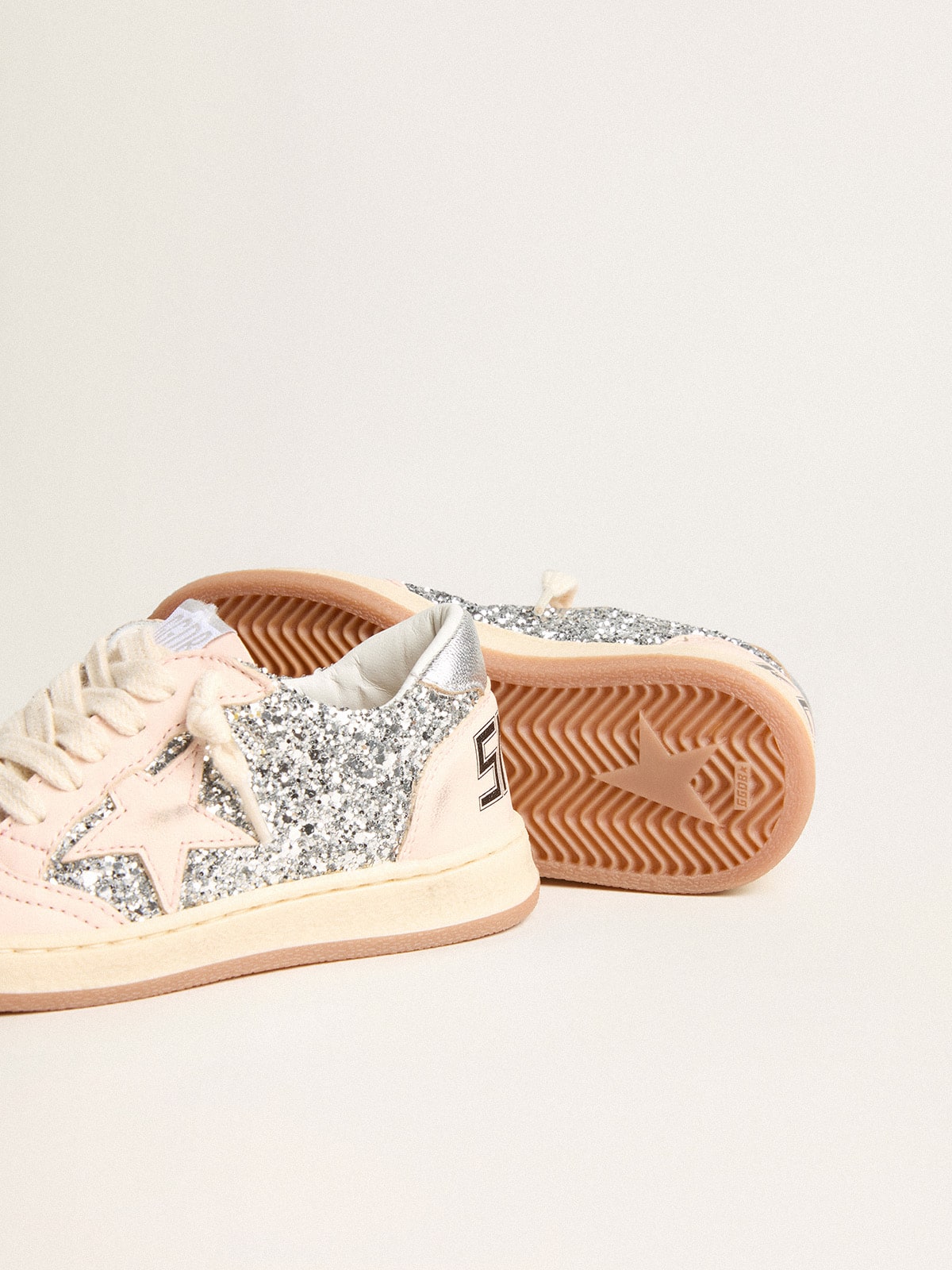 Golden Goose Young Ball Star in glitter with silver metallic leather heel tab