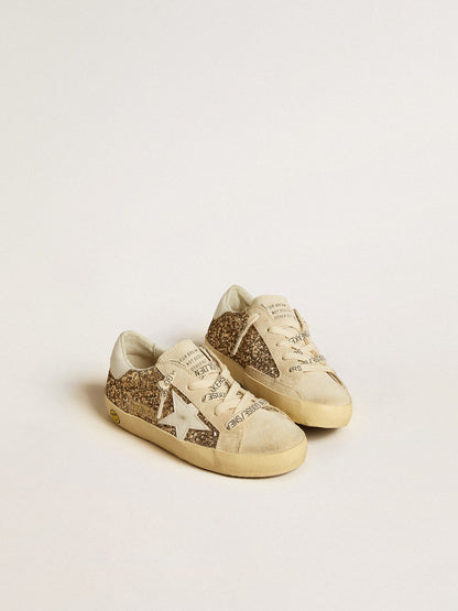 Golden Goose Super-Star Young in gold glitter with white leather star and heel tab