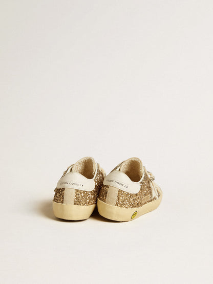 Golden Goose Super-Star Young in gold glitter with white leather star and heel tab