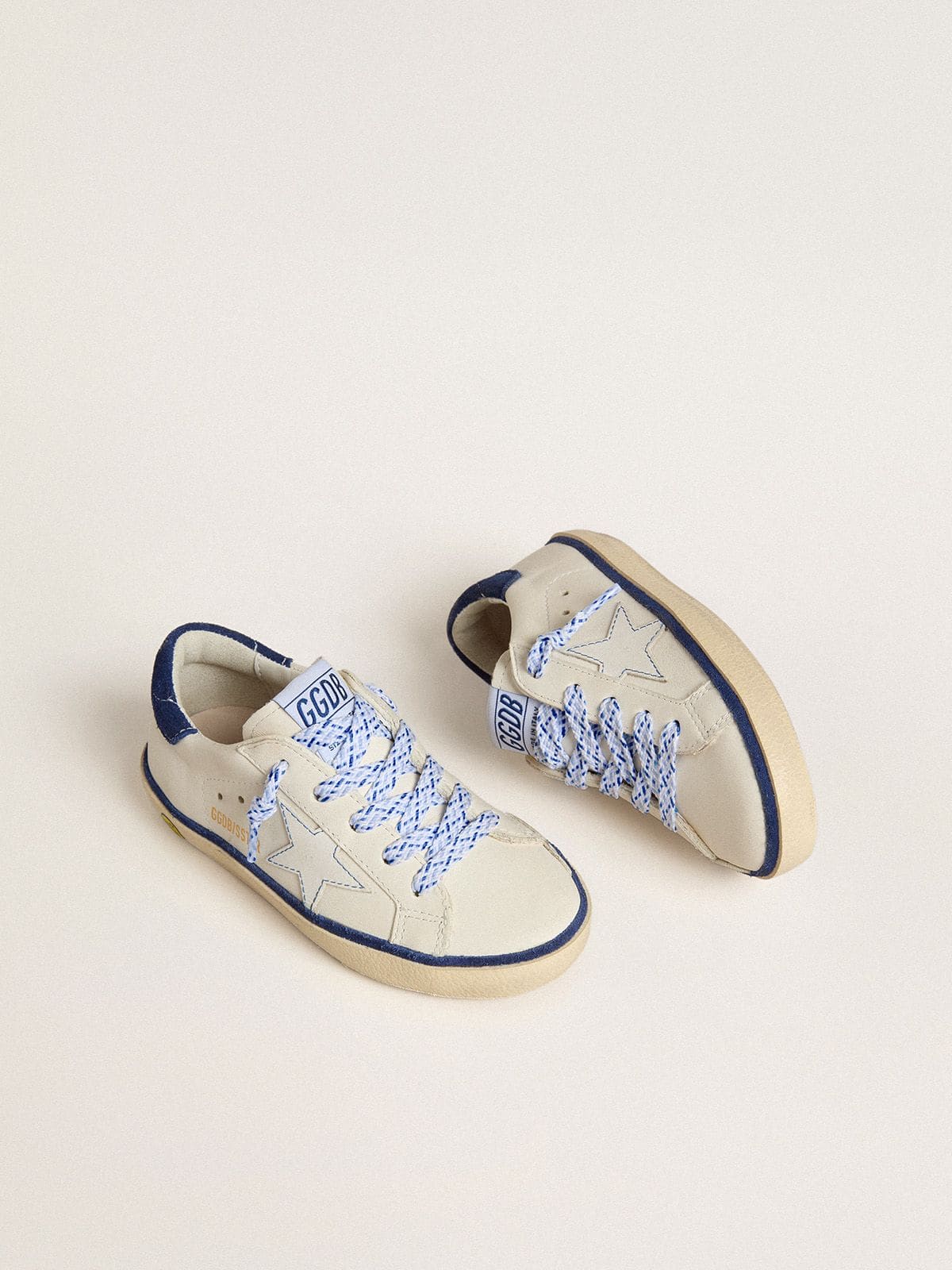 Golden Goose Junior Super-Star in white leather with blue suede heel tab